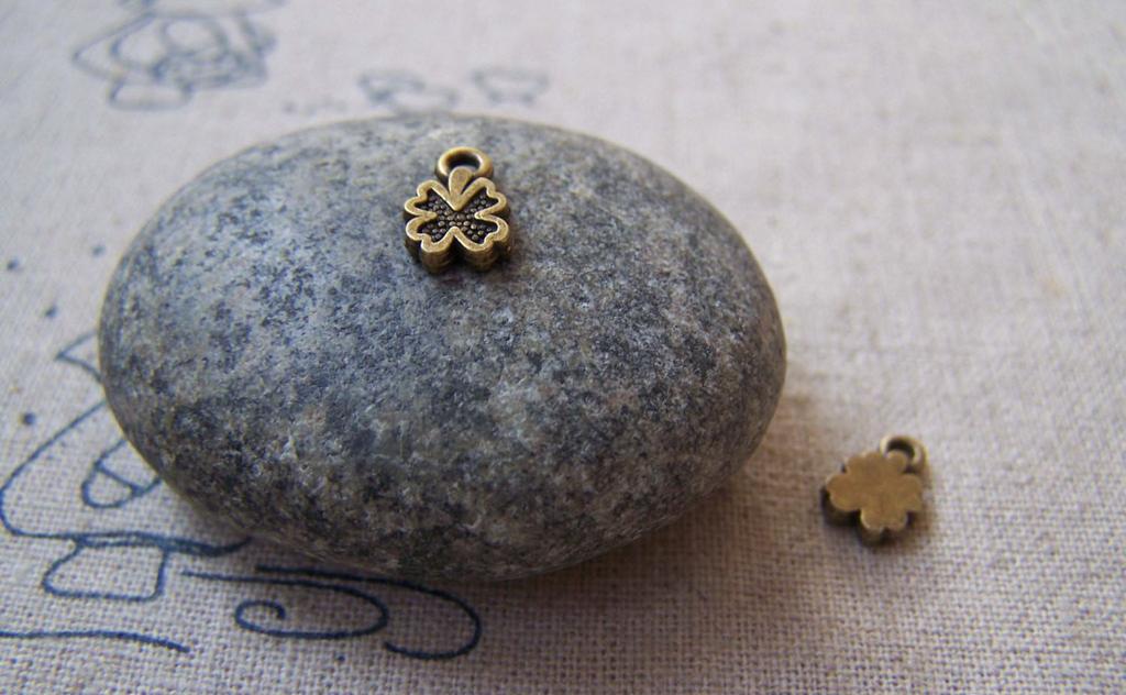 Accessories - 10 Pc Of Antique Bronze Tiny Ribbon Charms 6x9.5mm A5041