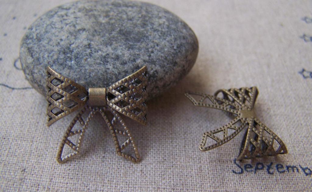 Accessories - 10 Pcs Of Antique Bronze Brass Filigree Bow Tie Knot Charms 20mm A3055