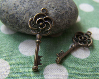 Accessories - 10 Pcs Of Antique Bronze Filigree Flower Key Charms 11x28mm A184
