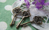 Accessories - 10 Pcs Of Antique Bronze Filigree Flower Key Charms 11x28mm A184