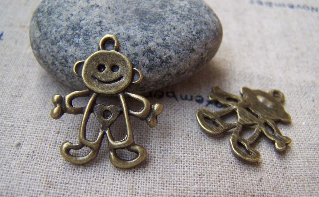 Accessories - 10 Pcs Of Antique Bronze Filigree Happy Boy Charms 21x25mm A698