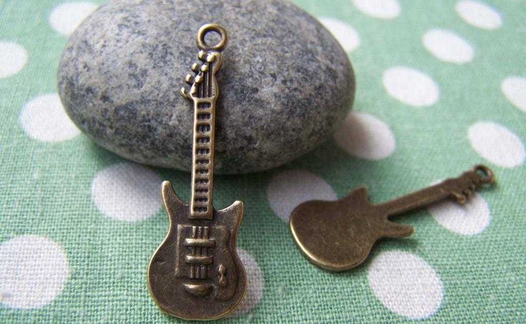 Accessories - 10 Pcs Of Antique Bronze Guitar Charms 11x35mm A1319