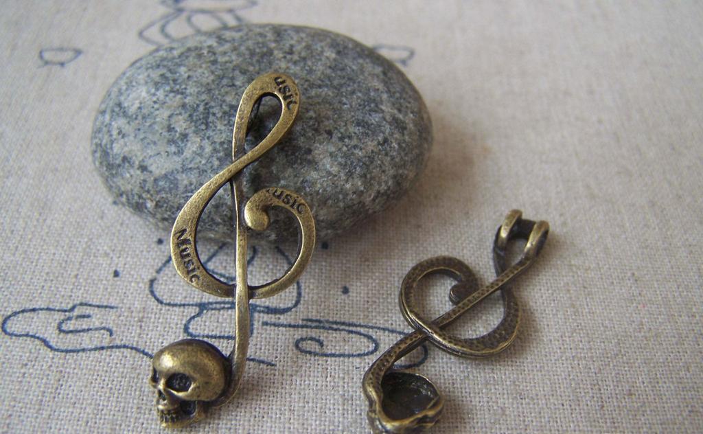 Accessories - 10 Pcs Of Antique Bronze Skull Music Note Charms 17x40mm A3098