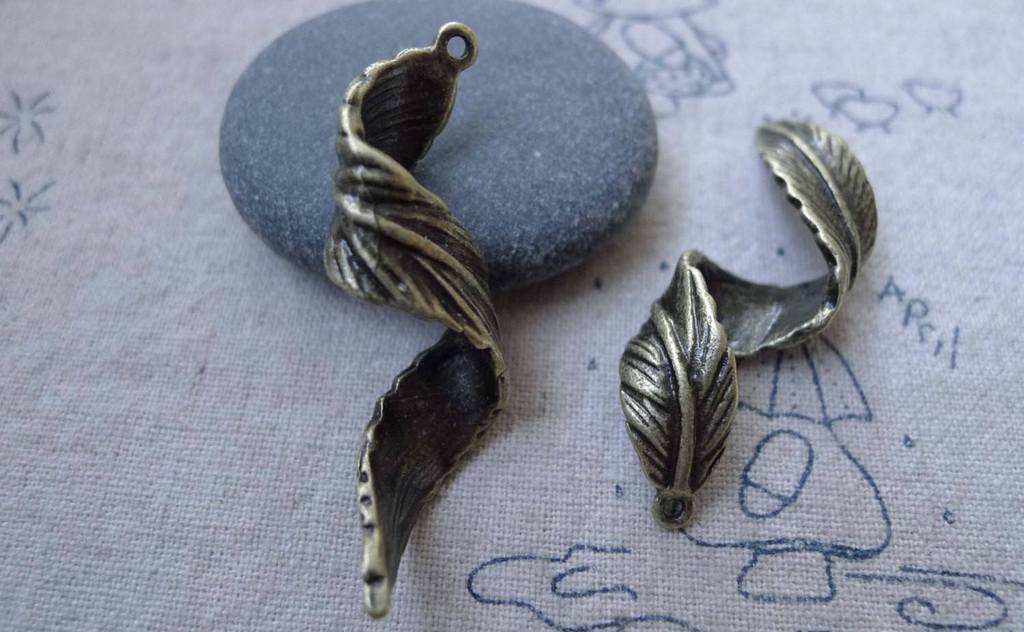 Accessories - 10 Pcs Of Antique Bronze Twisted Tree Leaf Charms Pendants 14x44mm A7666