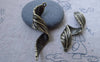 Accessories - 10 Pcs Of Antique Bronze Twisted Tree Leaf Charms Pendants 14x44mm A7666