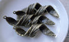 Accessories - 10 Pcs Of Antique Bronze Twisted Tree Leaf Charms Pendants 14x44mm A7666