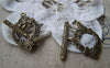 Accessories - 10 Sets Of Antique Bronze Oval Textured Flower Toggle Clasps 17x24mm A228