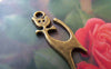 Accessories - 20 Pcs Of Antique Bronze Bow Tie Cat Charms 10x25mm A4152