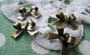 Accessories - 20 Pcs Of Antique Bronze Bow Tie Knot Charms 10x15mm A737