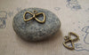 Accessories - 20 Pcs Of Antique Bronze Bow Tie Knot Charms 12x19mm A2169