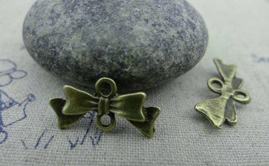 Accessories - 20 Pcs Of Antique Bronze Bow Tie Knot Connector 8x20mm A743