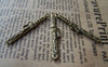 Accessories - 20 Pcs Of Antique Bronze Chinese Dragon Sword Charms Pendants Double Sided 7x43mm A1123
