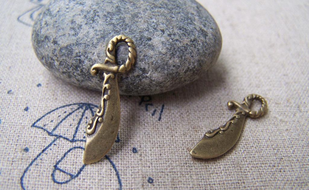 Accessories - 20 Pcs Of Antique Bronze Coiled Knife Charms Double Sided 7x25mm A1426