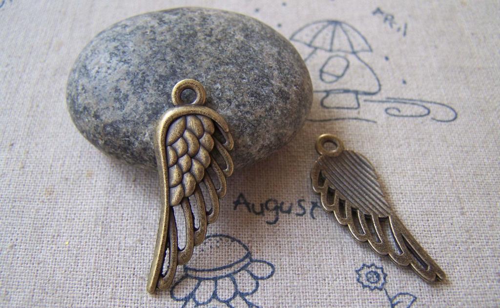 Accessories - 20 Pcs Of Antique Bronze Filigree Feather Wing Charms 12x33mm A5299