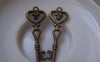 Accessories - 20 Pcs Of Antique Bronze Filigree Heart Key Charms 14x40mm A4952