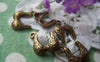 Accessories - 20 Pcs Of Antique Bronze Lovely Swirly Bra Charms 14x15mm A527