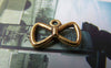Accessories - 20 Pcs Of Antique Gold Bow Tie Knot Charms 12x19mm A795