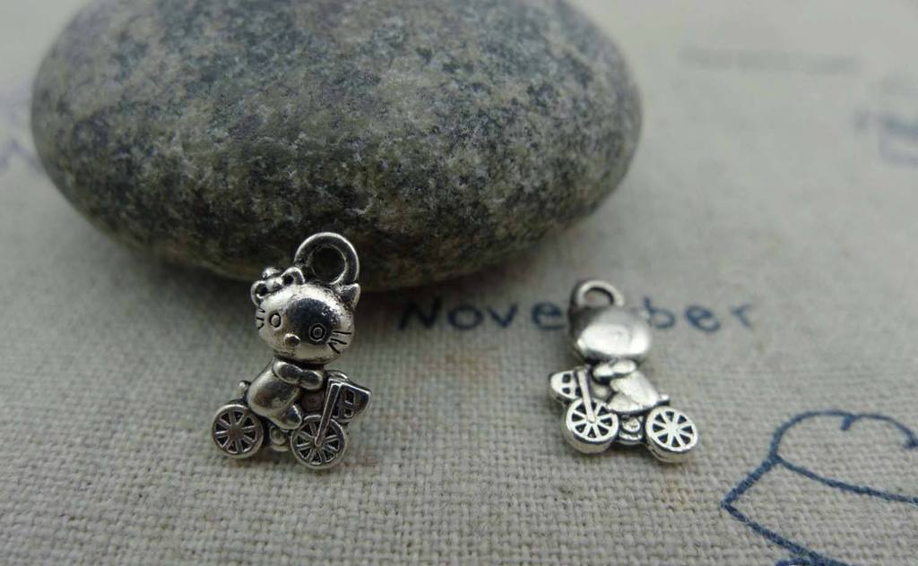 Accessories - 20 Pcs Of Antique Silver Cat Riding Bicycle Charms 7x12mm A1137