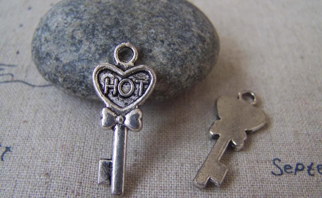 Accessories - 20 Pcs Of Antique Silver Hot Bow Tie Key Charms 12x25mm A1360