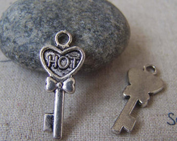 Accessories - 20 Pcs Of Antique Silver Hot Bow Tie Key Charms 12x25mm A1360