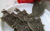 Accessories - 4 Pcs Of Antique Bronze Shield Badge Charms Pendants 28x43mm A263