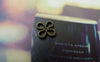Accessories - 50 Pcs Of Antique Bronze Tiny Coiled Chinese Knot Flower Charms 8mm A5652