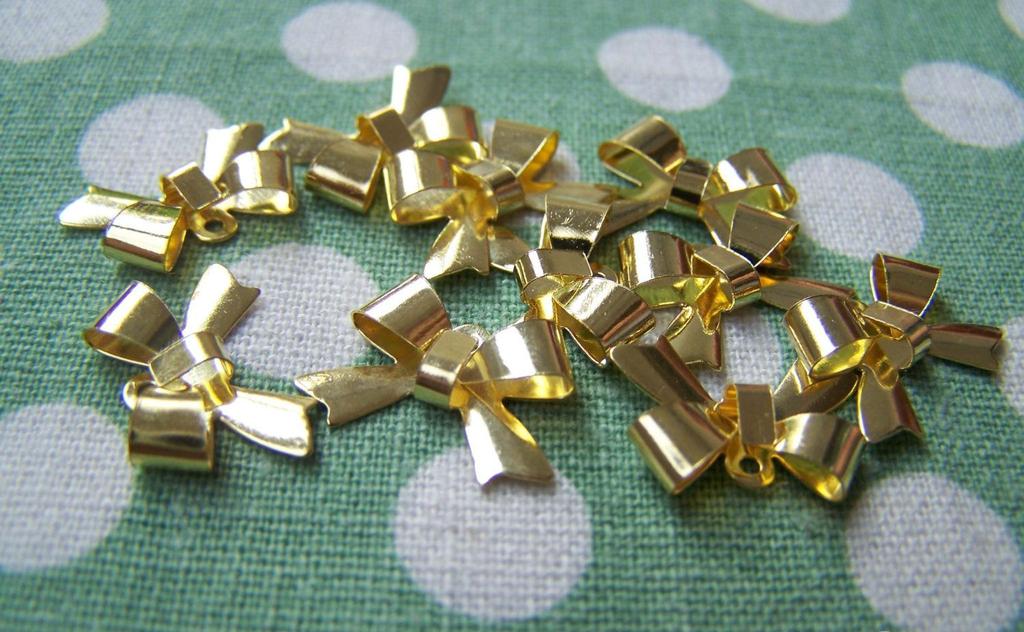 Accessories - 50 Pcs Of Gold Tone Bow Tie Knot Charms 11x15mm A793