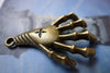 10 pcs of Antique Bronze Skull Skeleton Hand Pendants 25x40mm A5591