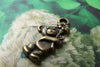 20 pcs Antique Bronze Cubs Bear Flower In Hand Charms A602