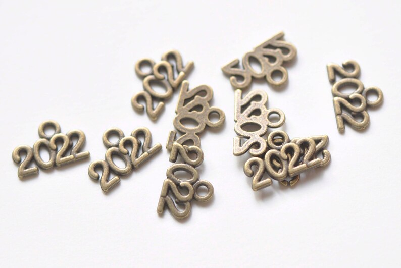 30 pcs Antique Bronze New Year 2022 Charms 10x13mm A2980