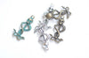 10 pcs of Antique Bronze/Silver/Green Patina Skull And Two Snakes Charms 15x37mm