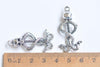 10 pcs of Antique Bronze/Silver/Green Patina Skull And Two Snakes Charms 15x37mm