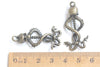 10 pcs of Antique Bronze/Silver/Green Patina Skull And Two Snakes Charms 15x37mm