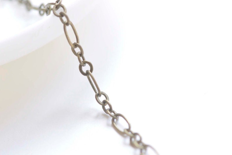 16ft (5m) Antique Bronze Brass Long And Short Oval Flat Chain 3x6mm A6375
