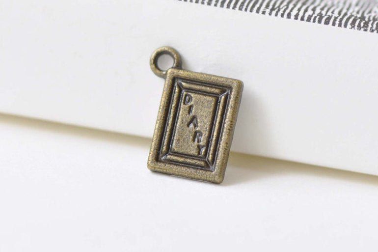 50 pcs Antique Bronze Diary Flat Charms 9x12mm A8473