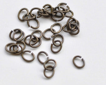 100 pcs Antique Bronze Oval Jump Rings 4x5mm 22G A8680