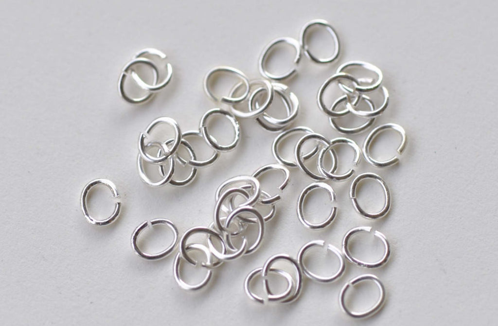 100 pcs Shiny Silver Oval Jump Rings Size 4x5mm 22G A8681