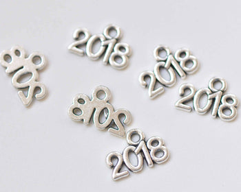 30 pcs Antique Silver New Year 2018 Charms 10x13mm A549