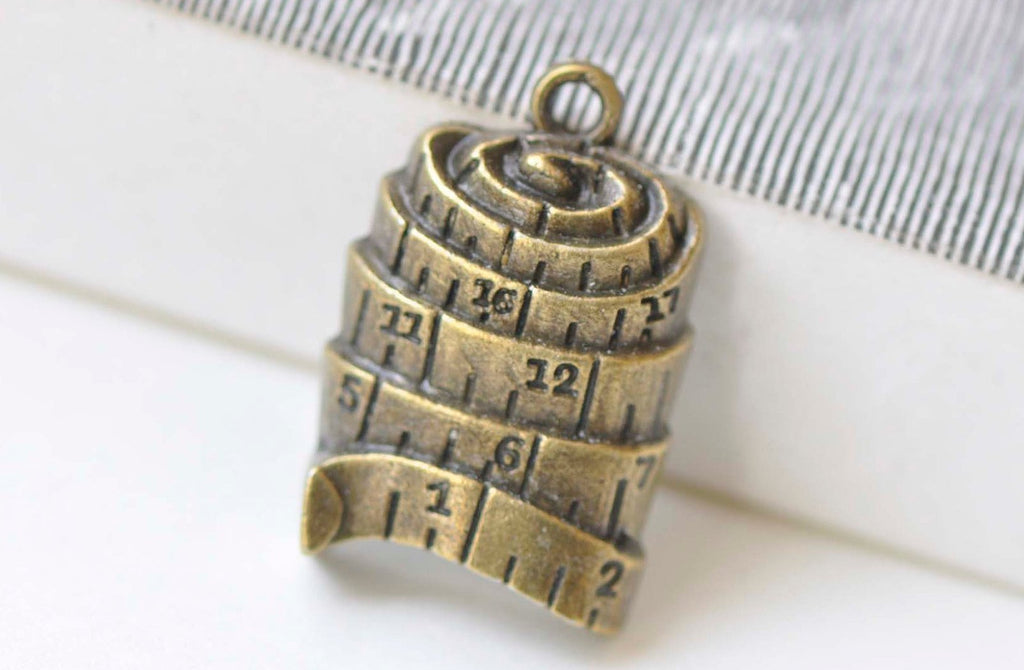 Antique Bronze Flexible Ruler Sewing Tape Charms Set of 20 A6613