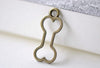 Antique Bronze Outlined Dog Bone Pet Ornament Charms Set of 20 A8013