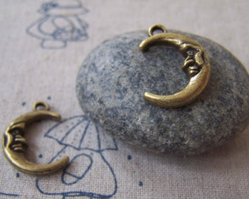 10 pcs Antique Bronze 3D Crescent Moon Face Charms Double Sided A4381