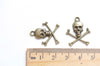 20 pcs of Antique Bronze/Silver/Patina Skull and Crossbones Charms 20x20mm