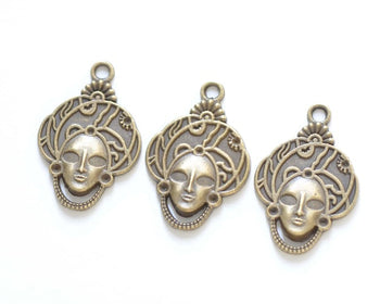 10 pcs of Antique Bronze Halloween Lady Mask Charms 20x31mm