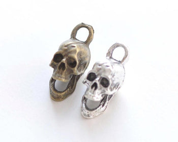 10 pcs of Antique Bronze/Silver Skull Charms 12x29mm