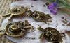 People's Accessories - 10 pcs Antique Bronze Bow Tie Summer Hat Charms A1409