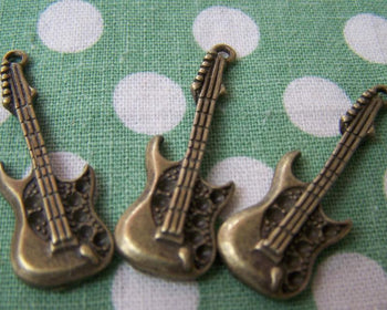 Accessories - 10 Pcs Of Antique Bronze Electric Guitar Charms 12x35mm A1697