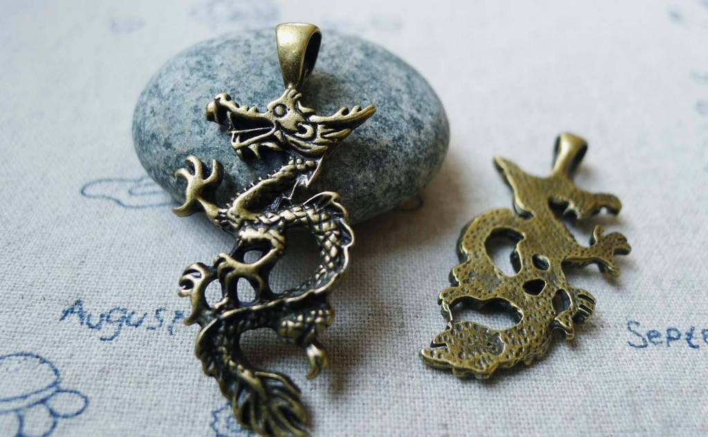 Accessories - 10 Pcs Of Antique Bronze Flying Dragon Charms Pendants 21x46mm A5587