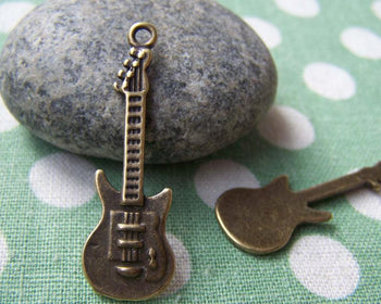 Accessories - 10 Pcs Of Antique Bronze Guitar Charms  11x35mm A1319