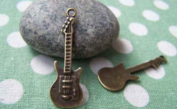 Accessories - 10 Pcs Of Antique Bronze Guitar Charms  11x35mm A1319