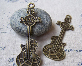 Accessories - 10 Pcs Of Antique Bronze Guitar Charms Pendant Double Sided 22x63mm A5576